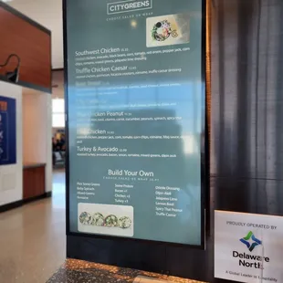 a sign in the lobby of a building