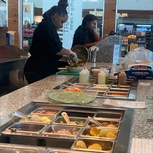 This line would be more efficient if the other person wasn't on their phone