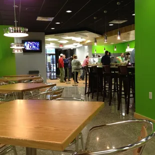 a restaurant with tables and chairs