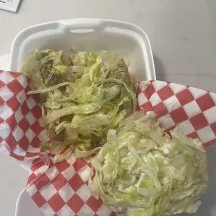 This is their grilled chicken sandwich. Two lousy tenders hidden under all that lettuce. Mediocre flavor to boot.