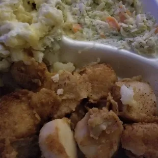 This is the scallops i ordered supposed to be fried all the breading was in the container with puddle of grease and they were overcooked.