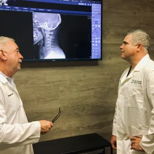 Dr. Forbes and Dr. Cooperman discussing X-rays.