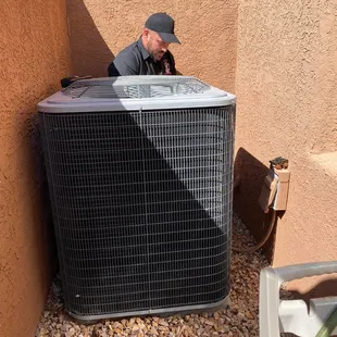 Technician Chris working on {Lennox} Condenser
