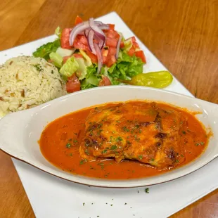 Moussakka Plate Eggplant, zucchini, and potatoes baked with béchamel. V. GF. Comes with Pita Bread, Salad and Rice