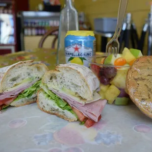 a sandwich and fruit salad