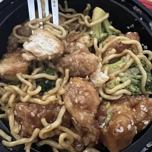 Sesame chicken and broccoli with lol mein