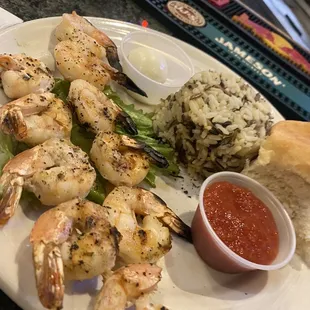 Skewered Shrimp with rice.