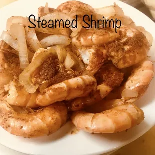 a plate of cooked shrimp