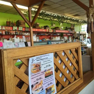 a sign in front of the counter