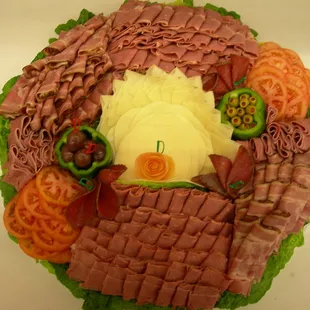 a platter of meat and cheese