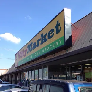 cars parked in front of the store