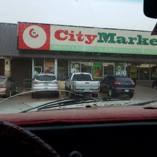 cars parked in front of the store