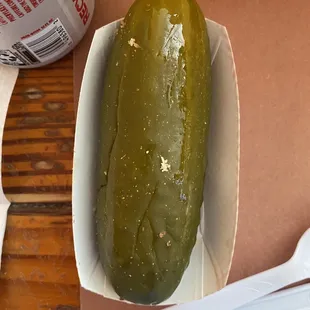 A gigantic dill pickle