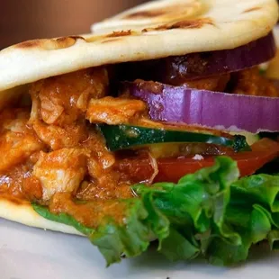 Blazing Beale it's a panini made with  curry chicken on naan bread
