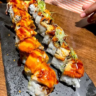 Hamachi volcano roll (left) and unagi dragon roll (right)