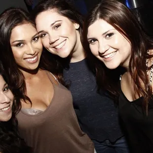 a group of women posing for a picture