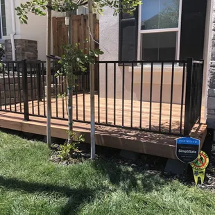 Deck and metal railing