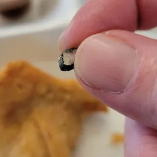 There was a hard piece of glass or something in the samosa that I bit down on. So weird.