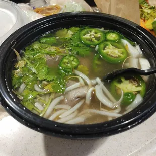 Rotten cilantro and the soup is very light hint in flavor the noodles are undercooked and hard