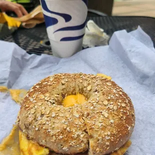 Multigrain bagel with egg and cheese.