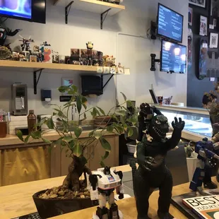 a table with toys and a tv