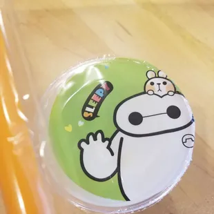 a plastic cup with a sticker on it