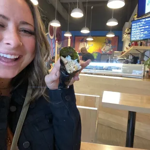 Happy customer eating the spicy tuna roll! Love the bell peppers in it!