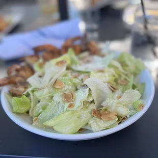 a plate of salad on a table