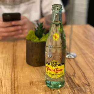 a bottle of water on a table