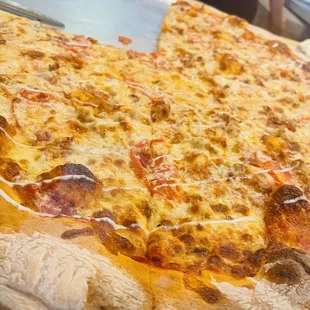 a slice of pizza on a plate