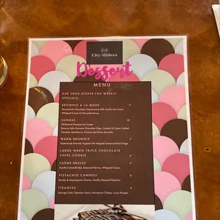a dessert menu on a table