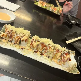 Cherry Valley roll - no masago- add crunch on top. Jessica Roll in back
