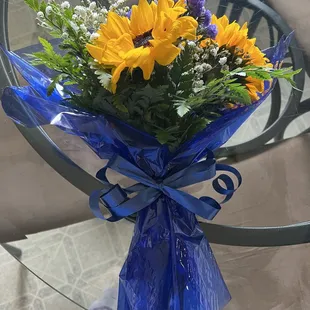 My mom loved sunflowers so I purchased this bouquet for my brother, sister and I.