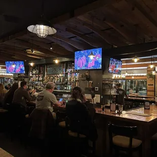 people sitting at the bar