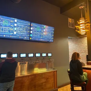 Pay by the ounce beer taps.  Mostly Nebraska brews and Busch Light