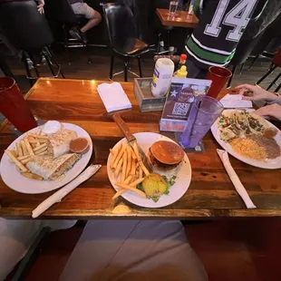 Tacos, burger, and burrito from City Tavern