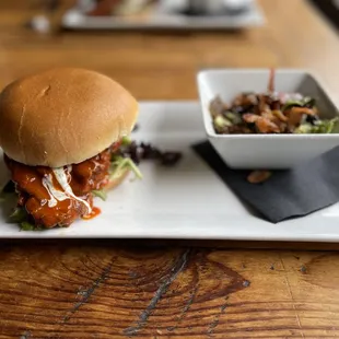 Buffalo Chicken Sandwich and Brussel sprout leaves.