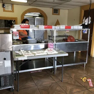 Inside where tacos are made. They also have specials of the day so look at the menu.