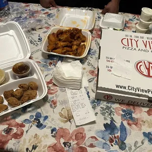 Boneless Bites with sauce on the side, Buffalo Wings, Large Pizza