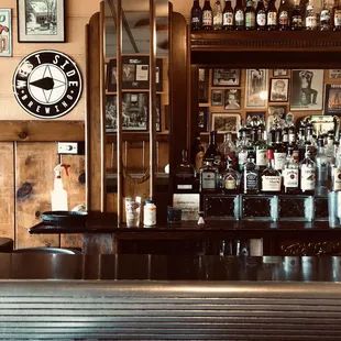 a bar with a clock on the wall