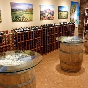 a wine cellar with wine barrels