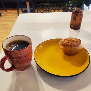 a muffin and a cup of coffee