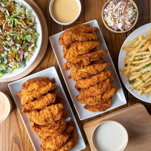 fried chicken, fries, coleslaw, salad and dressing