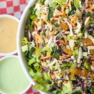 a bowl of salad with dressing