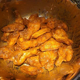 a bowl of chicken wings