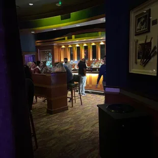 people sitting at a bar