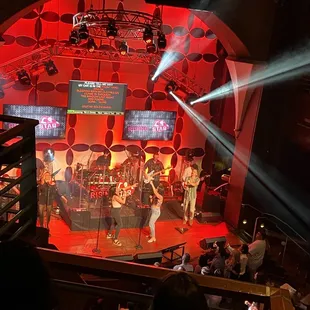 a band performing on stage