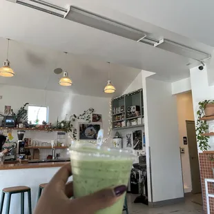 Matcha latte with lavender syrup and oat milk