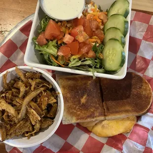 Grilled cheese, salad and side of pork.