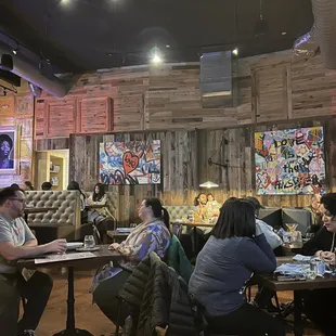 a group of people sitting around a table